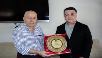İKSAD Enstitüsü ve Herkari Bilim Sanat Edebiyat Derneği Temsilcileri Rektörümüzü Ziyaret Etti - Resim 1